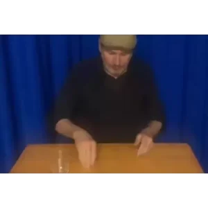 Coins Through the Table by Joaquin Matas