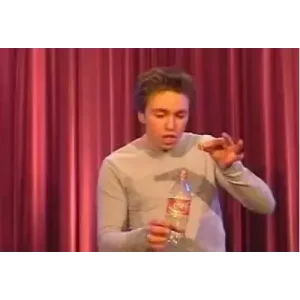 Impromptu Coin Thru Bottle by Peter Eggink