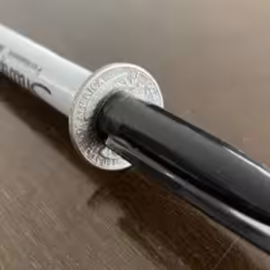 Tango – Sharpie thru Coin